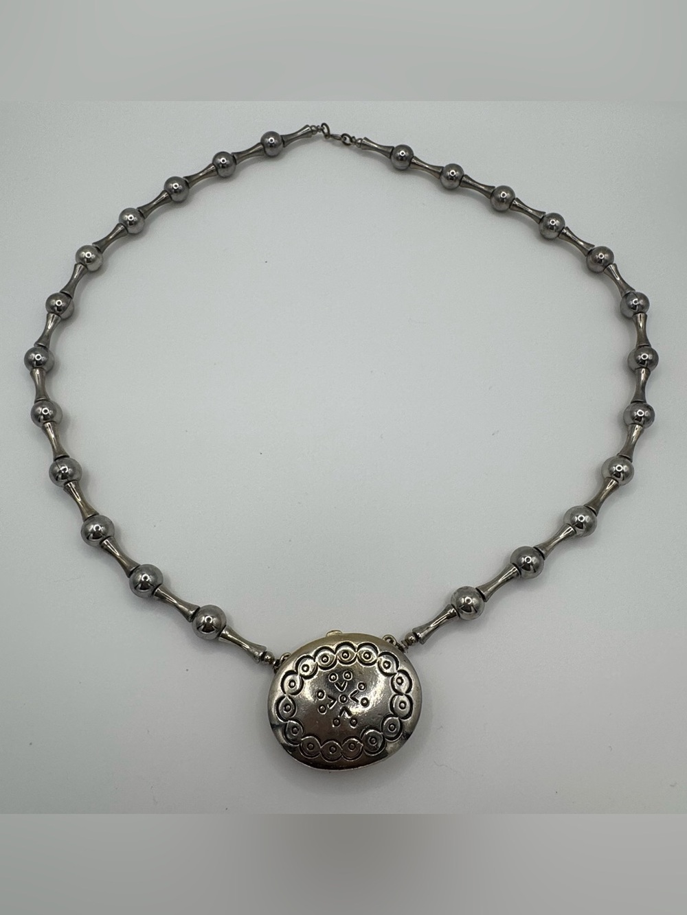 Vintage 1973 Estee Lauder Moonsilver Solid
Perfume Necklace Full Locket Pendant